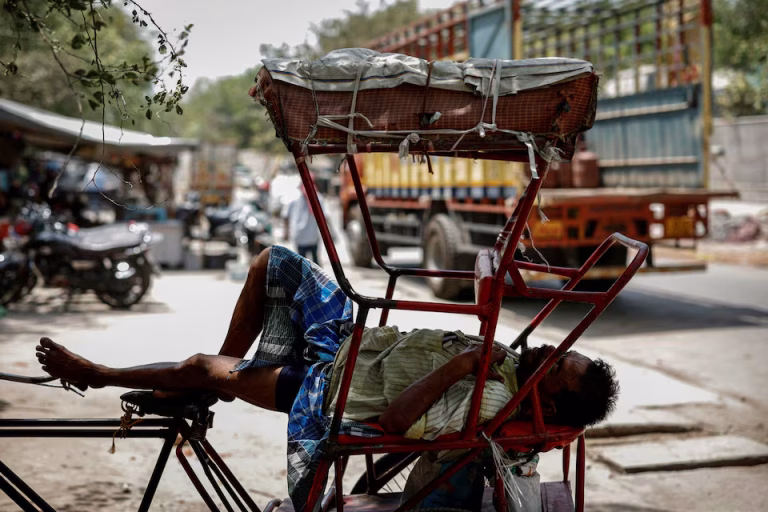 India battles power cuts as heatwave boosts electricity demand to record