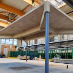 Optimized concrete slabs cut material use without weakening floors