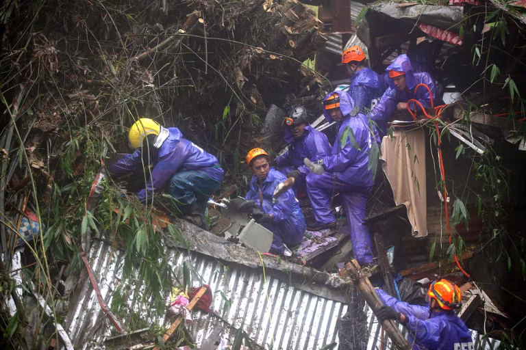 Floods and landslides kill 15 as Philippines hit by nine days of incessant rain